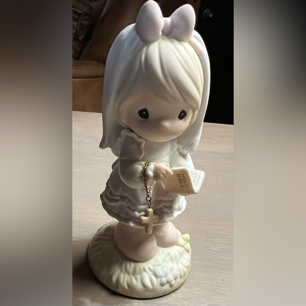 Precious Moments religious figurine for a girl baptism or communion.